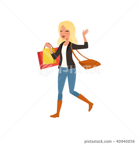 Happy blond woman walking with shopping bags from store. Big sale. Young girl with bag on shoulder 40940856