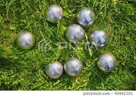 petanque bowls in the green grass petanque bowls in the green grass 40942101