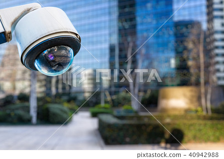 security CCTV camera with buildings on background 40942988