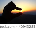Sunrise in a hand from a terrace of Mount Nemrut 40943283