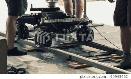 Setting dolly track for video shooting production Setting dolly track for video shooting production 40943462