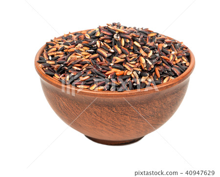 Black rice in a bowl 40947629