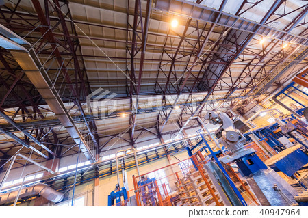 Fiberglass production industry equipment at manufacture background 40947964