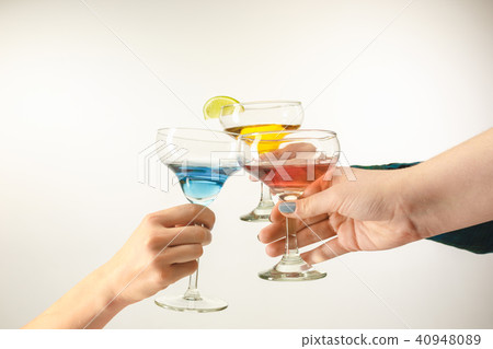 The male and female hands with exotic cocktails 40948089