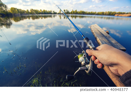 Fishing with rod on lake Fishing with rod on lake 40948377