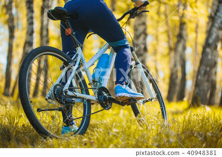 cyclist riding mountain bike in the forest cyclist riding mountain bike in the forest 40948381