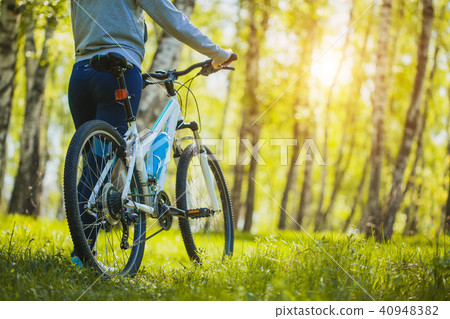 cyclist riding mountain bike in the forest cyclist riding mountain bike in the forest 40948382