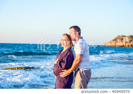 Portrait of happy love pregnant couple Portrait of happy love pregnant couple 40948970