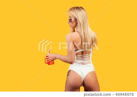 Slim sexual woman with drink Slim sexual woman with drink 40948978