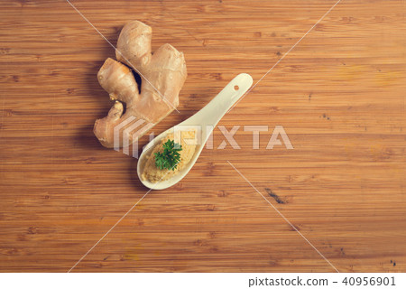 ginger paste with spoon and copyspace ginger paste with spoon and copyspace 40956901