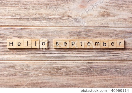 hello September word written on wood block. hello September word written on wood block. 40960114