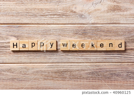 happy weekend word written on wood block. happy weekend word written on wood block. 40960125