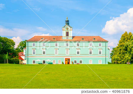 Green lawn in front of renaissance chateauin Dacice. Remodeled in the Baroque and Empire styles 40961876
