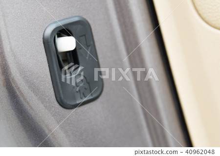 lock button to prevent children from opening doors lock button to prevent children from opening doors 40962048