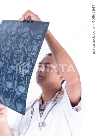 Doctor looking film s-ray knee area 40962644