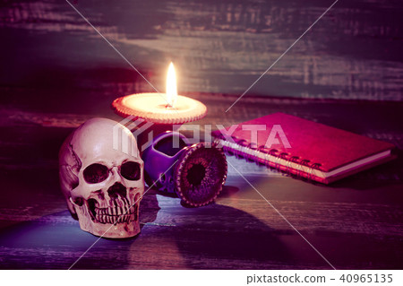 still life human skull and book with candlestick still life human skull and book with candlestick 40965135