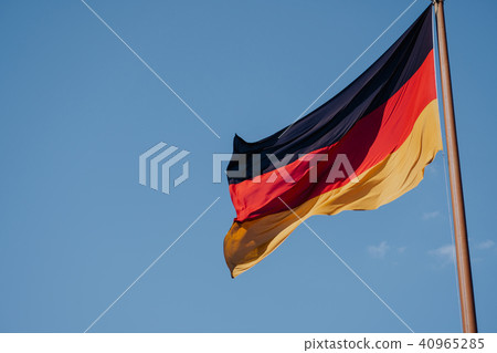 German national flag on blue sky background German national flag on blue sky background 40965285
