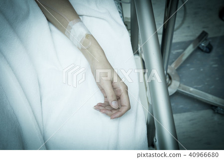a hand of a patient during a surgical operation a hand of a patient during a surgical operation 40966680