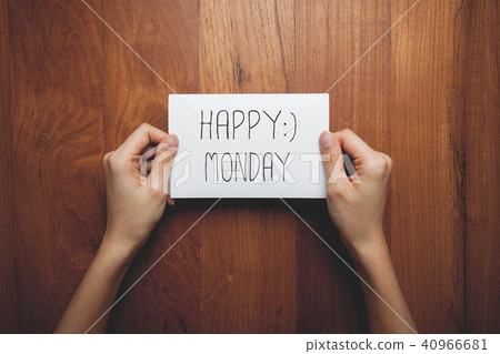 a woman with a sign with the words in her hand 40966681