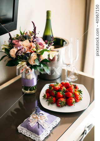 wedding bouquet boutonniere bottle of champagne 40967150