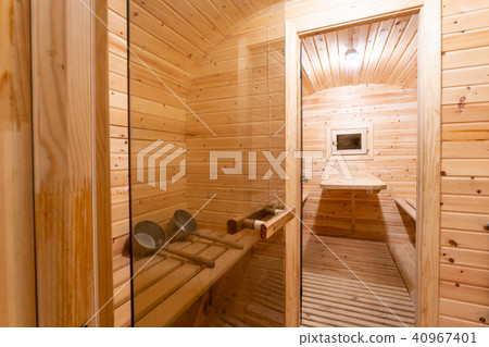 interior of sauna. rural mobile wooden bath in the form of a barrel in a pine forest 40967401