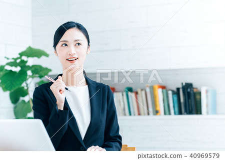 Women in a jacket business 40969579