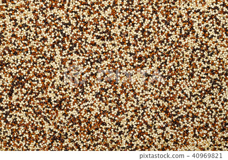 Mixed quinoa seeds, surface and background 40969821