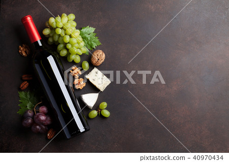 Wine, grape and cheese 40970434
