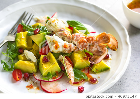 Crab with Avocado and Pomegranate salad 40973147
