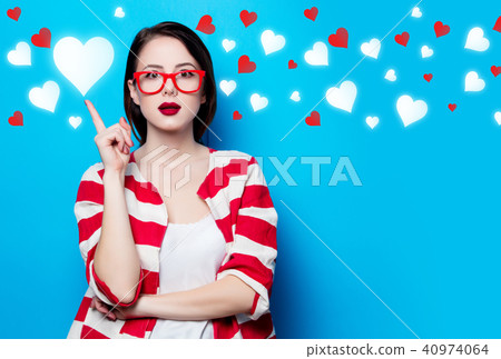 young surprised woman with hearts 40974064