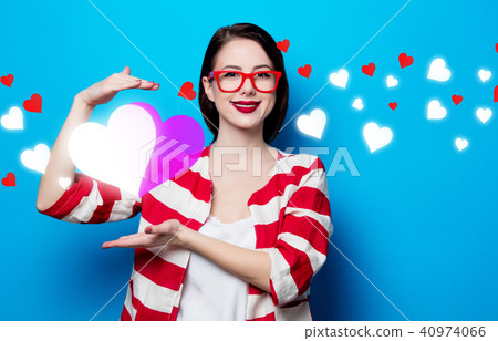 woman on the blue background with hearts 40974066
