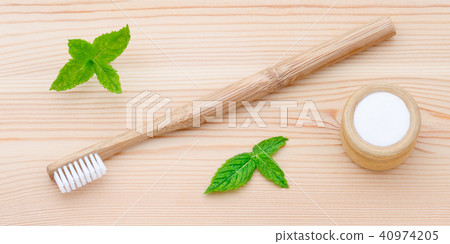 wood toothbrush and xylitol, soda, powder, salt, mint on wooden 40974205