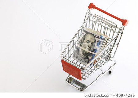 Dollars in a supermarket cart Dollars in a supermarket cart 40974289