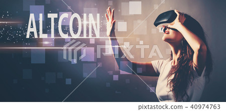 Altcoin with woman using a virtual reality headset 40974763