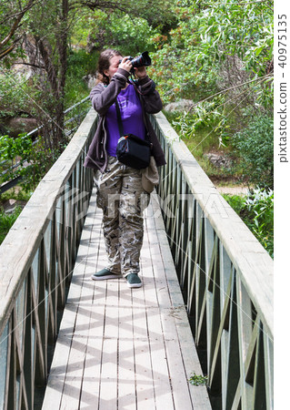tourist takes photo in Ihlara Valley in Cappadocia 40975135