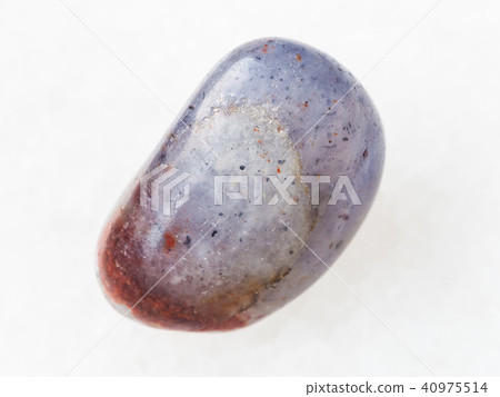 polished Cordierite gemstone on white polished Cordierite gemstone on white 40975514