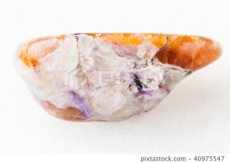 charoite in tumbled Tinaksite gemstone on white charoite in tumbled Tinaksite gemstone on white 40975547