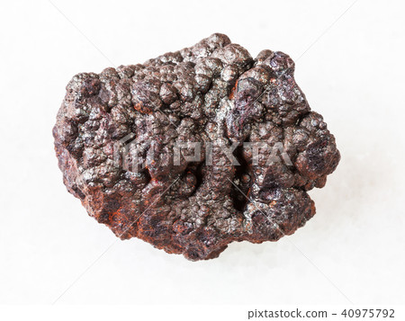 rough Goethite stone (brown iron) on white rough Goethite stone (brown iron) on white 40975792