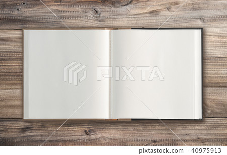 Open book wooden background Minimal flat lay Open book wooden background Minimal flat lay 40975913