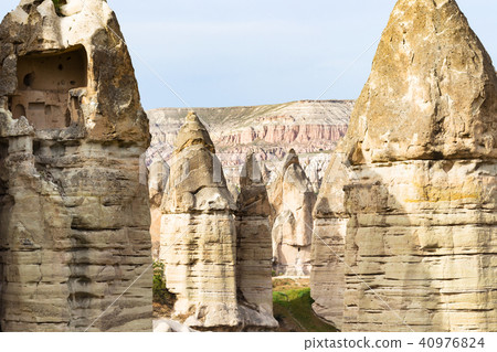 many fairy chimney rocks in mountains of Goreme many fairy chimney rocks in mountains of Goreme 40976824