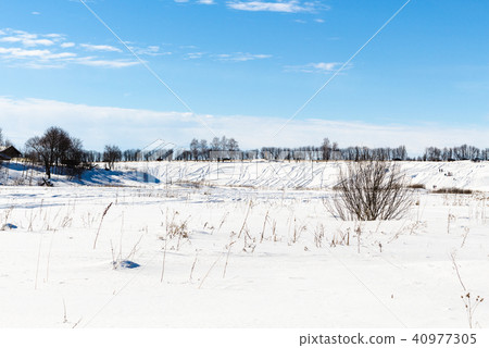 snowy landscape with frozen river in Suzdal 40977305