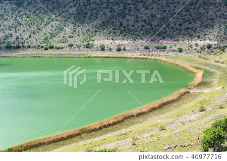 green water of Narligol Crater Lake in Cappadocia 40977716