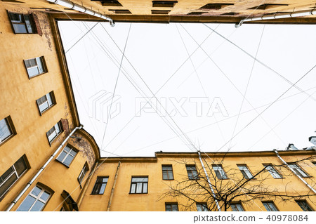electrical wires and cables over urban courtyard electrical wires and cables over urban courtyard 40978084