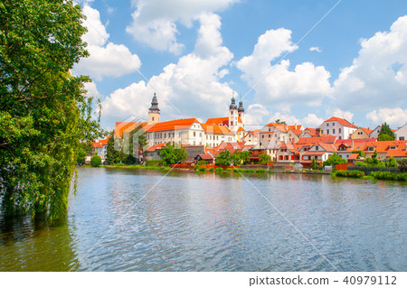 Panoramic view of Telc with reflection in Stepnicky pond, Czech Republic. UNESCO World Heritage Site Panoramic view of Telc with reflection in Stepnicky pond, Czech Republic. UNESCO World Heritage Site 40979112