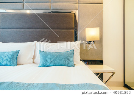 White pillow on the bed White pillow on the bed 40981893