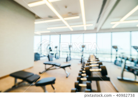 Abstract blur and defocused fitness equipment in gym interior Abstract blur and defocused fitness equipment in gym interior 40982738