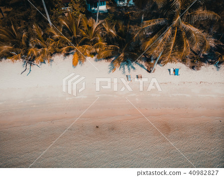 Beautiful nature tropical beach and sea with coconut palm tree on paradise island Beautiful nature tropical beach and sea with coconut palm tree on paradise island 40982827