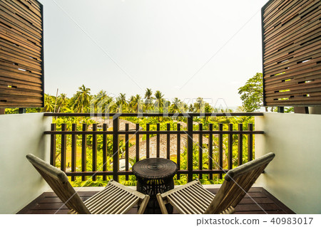 Outdoor patio with table and chair 40983017