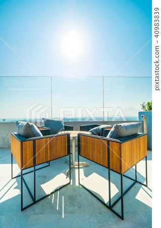 Outdoor patio decoration with char and table Outdoor patio decoration with char and table 40983839