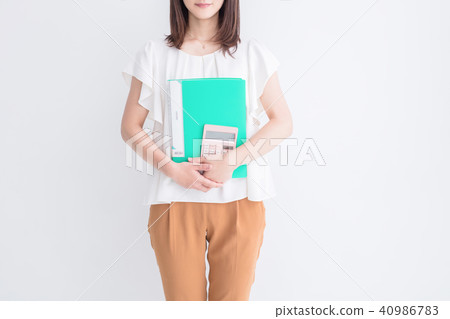 Housewife with calculator and document Housewife with calculator and document 40986783